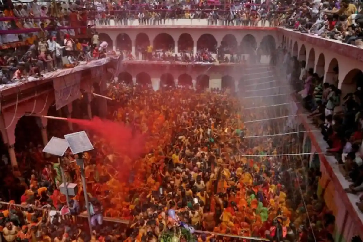 Celebrating Huranga on the premises of the Dauji Temple; Image Source- India Today 