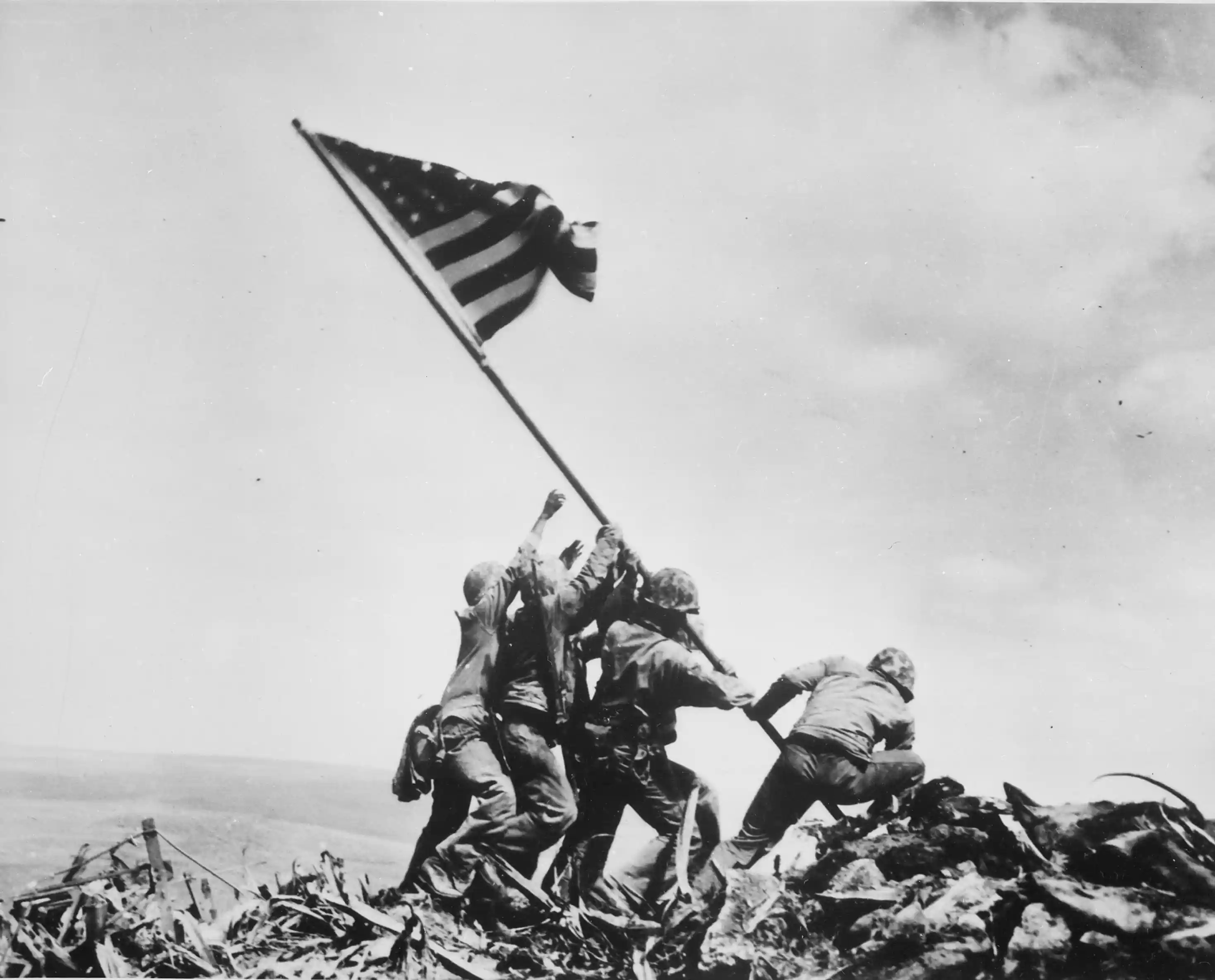 Joel Rosenthal's photograph, Raising the Flag on Iwo Jima. Image Source: Wikimedia Commons