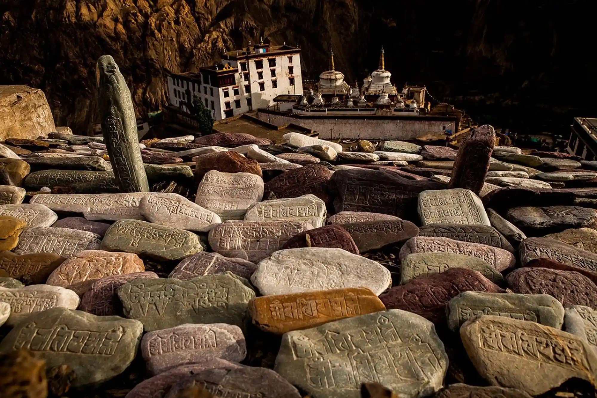 Rocks with Tibetan inscriptions; Image Source: Sandeepachetan’s Travel Blog