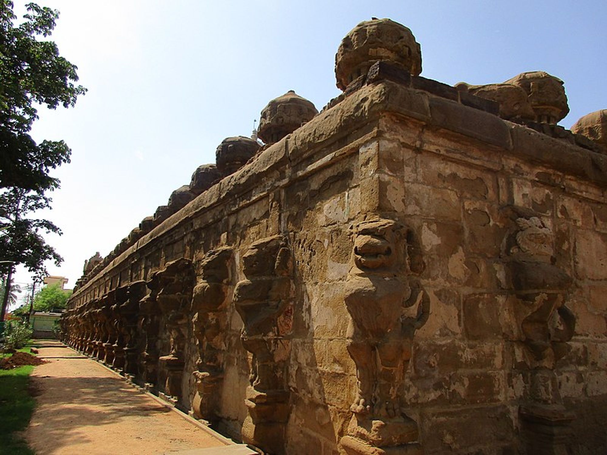 The outer wall of the Temple I Source: Wikimedia Commons