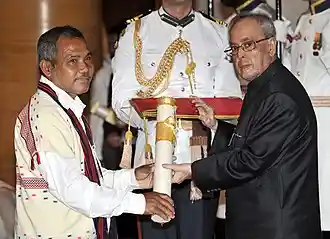 President Pranab Mukherjee awarding Padma Shri to  Jadav Payeng (image source: Wikipedia)