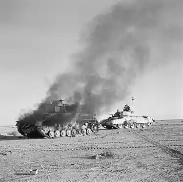 Destroying German tanks during WWII; Image source: Wikipedia 