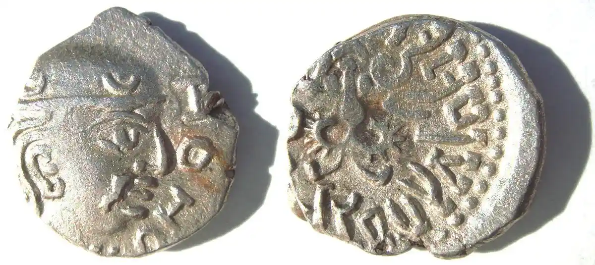 Irregular shaped coins with symbols imprinted ; Source : Wikimedia Commons 