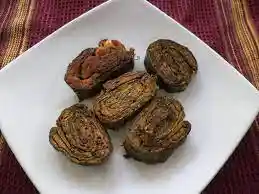 Made from Arbi leaves, Besan, and spices. Image source: Pinterest